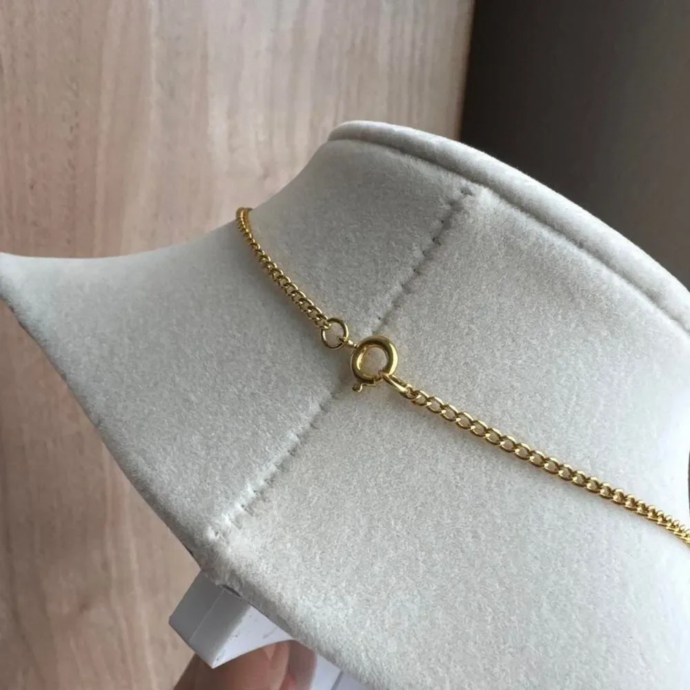 Source Unknown gold tone